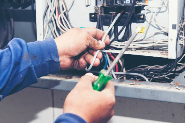 Electrical Troubleshooting in South Lake Tahoe, CA as an electrician tests a residential breaker panel